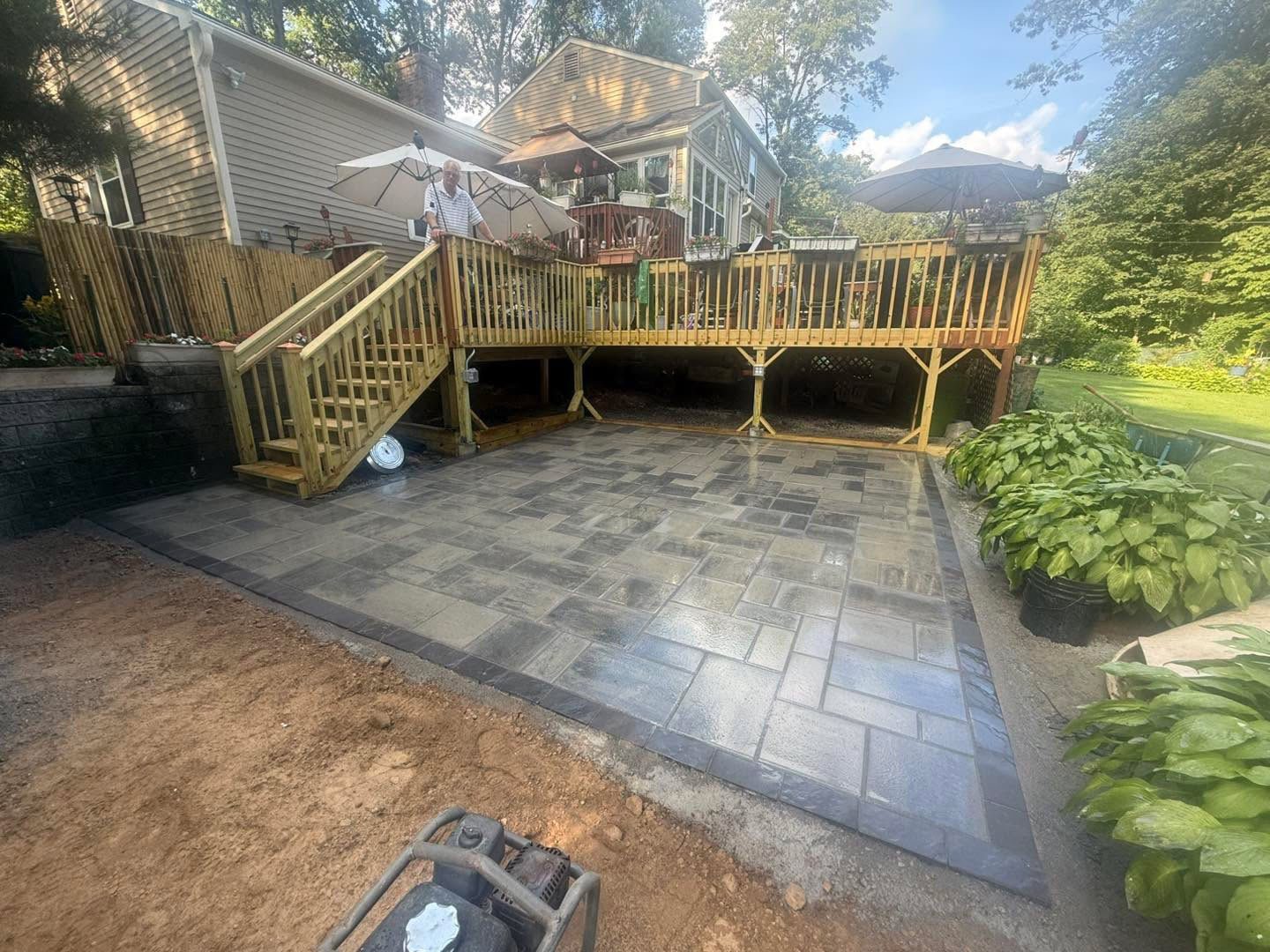 Paver patio and deck built by TNT Masonry & Pavers in Connecticut